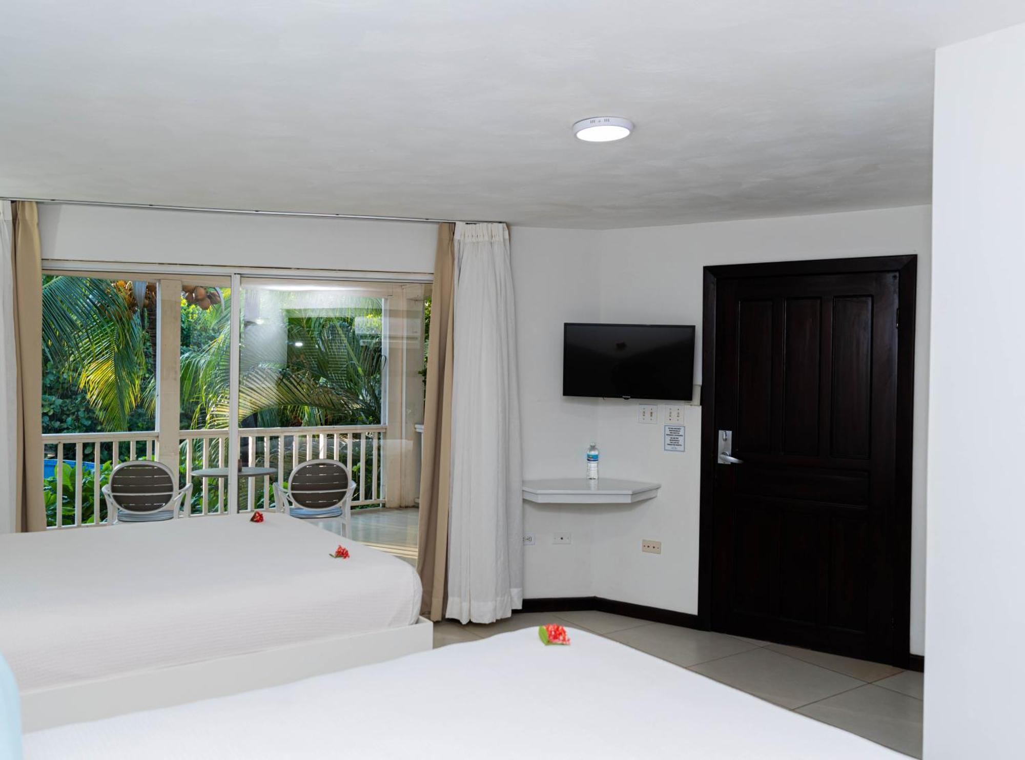 Paradise Beach Hotel West Bay Zimmer foto
